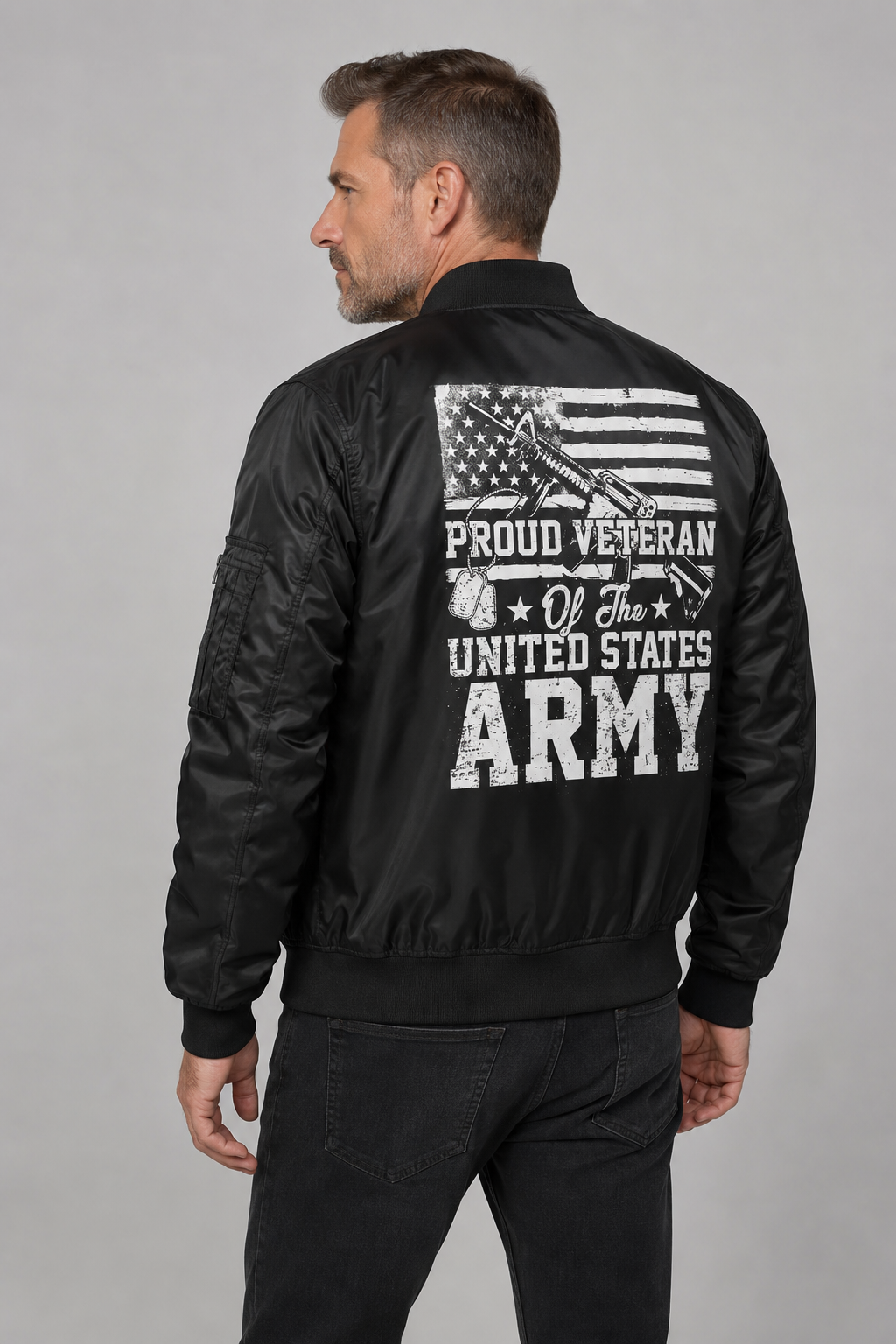 Adult model wearing Proud U.S. Army Veteran Flag black bomber jacket, three-quarter back view