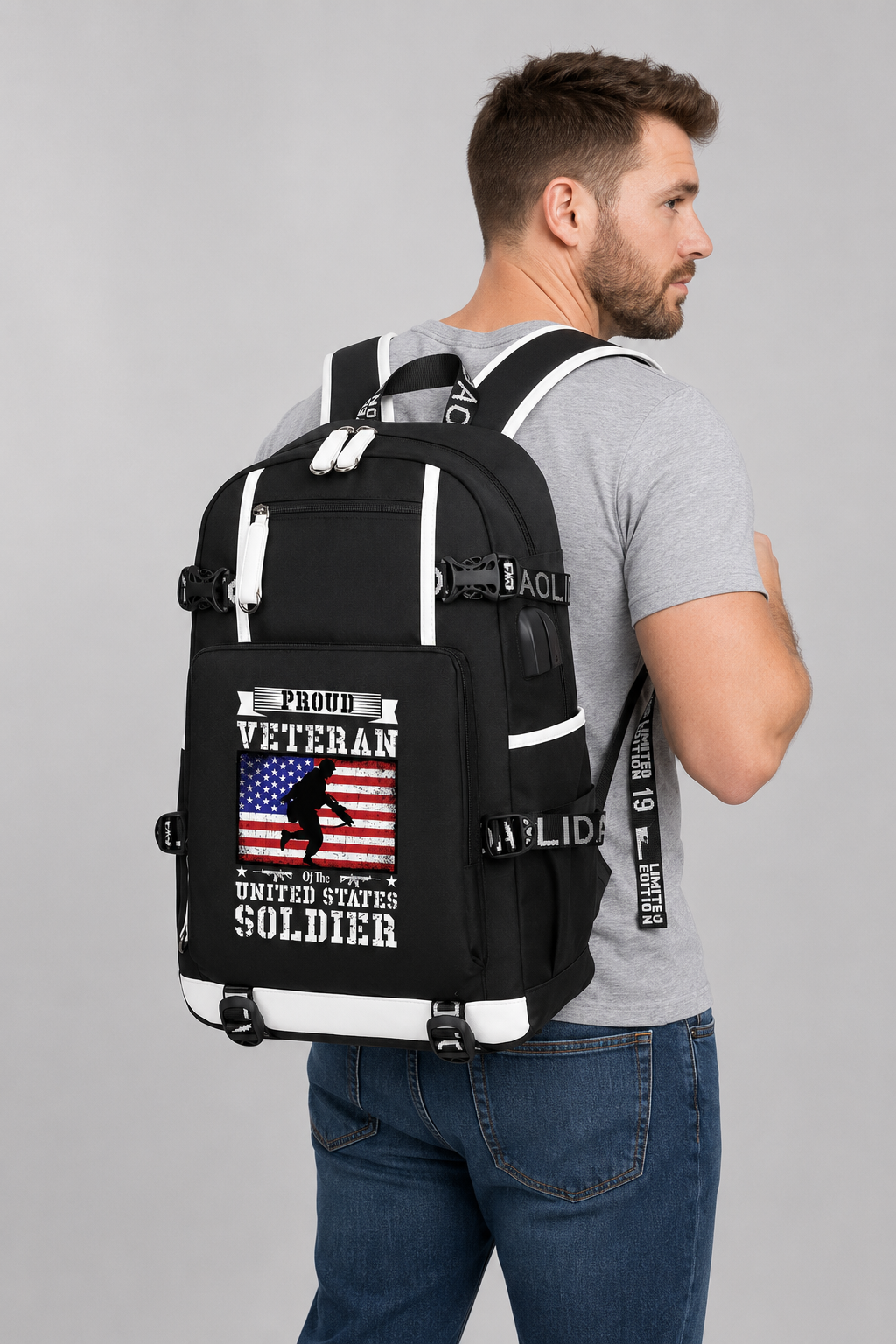 Adult model wearing Proud Veteran U.S. Soldier Flag black backpack, three-quarter rear view