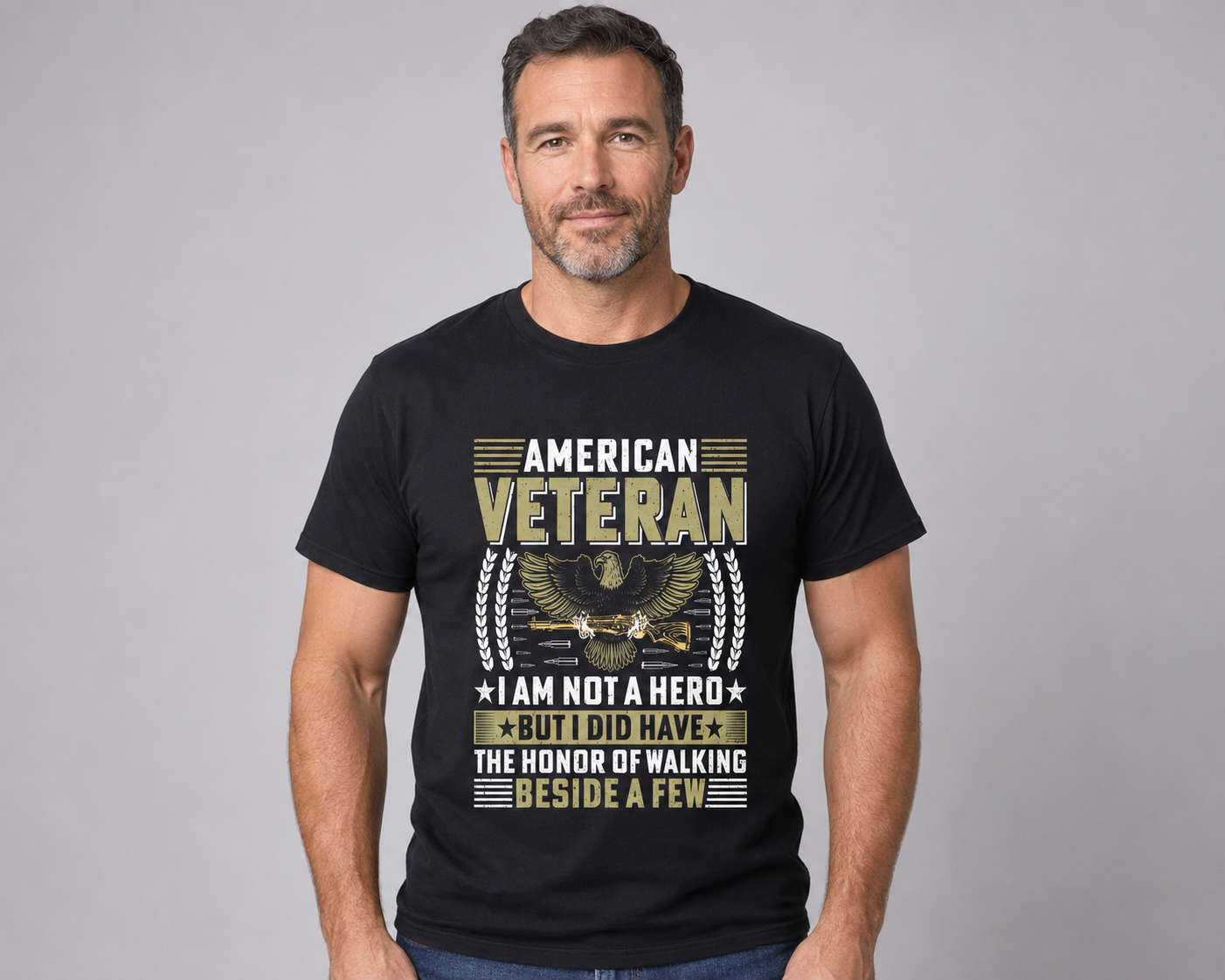 Adult model wearing American Veteran I Am Not a Hero black graphic T-shirt, front view