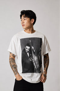 Thumbnail for Model wearing the white Charles Mingus jazz portrait T-shirt, bassist Charles Mingus printed on the front