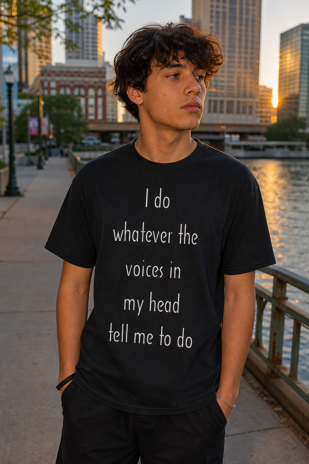Model wearing "I Do Whatever The Voices in My Head Tell Me to Do" Tshirt, three-quarter view