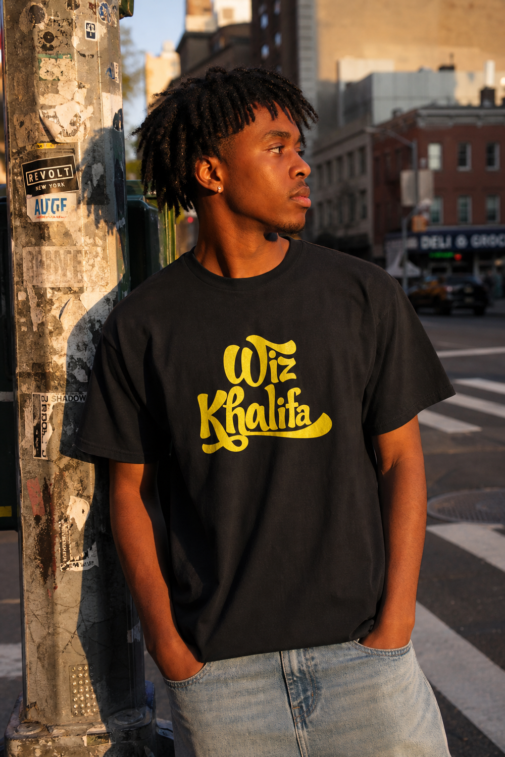 Model wearing "Wiz Khalifa" Tshirt, three-quarter view