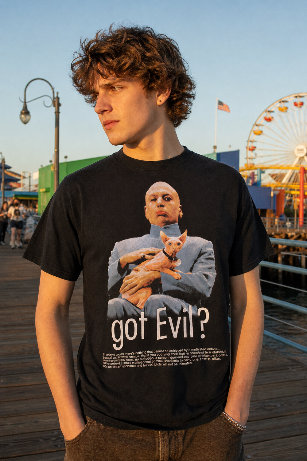 Model wearing Dr. Evil Got Evil Tshirt, three-quarter view